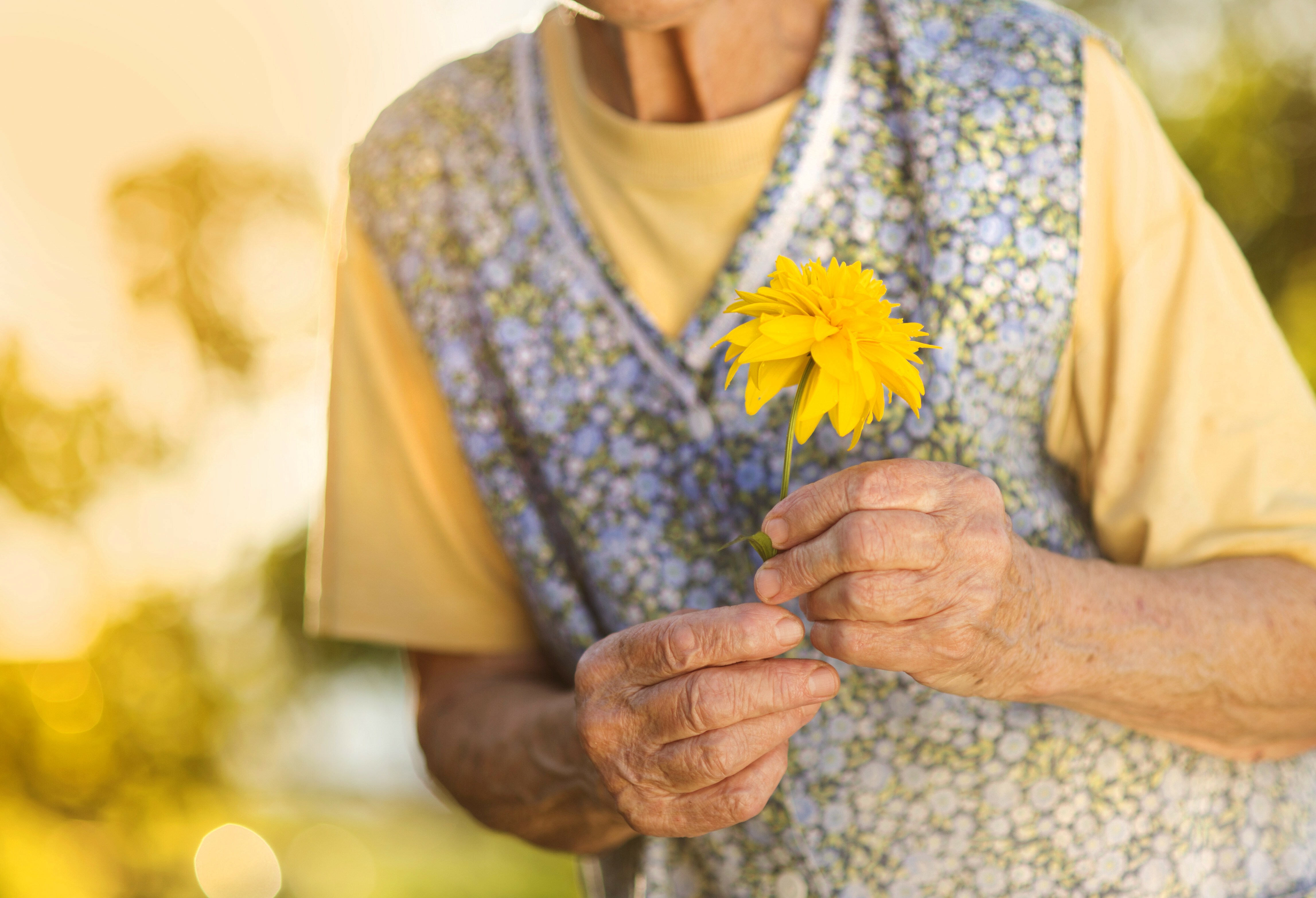 Senior with flower